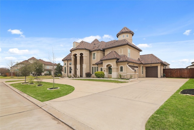 18111 Dockside Landing Dr, Cypress, TX 77433 - mediterranean / spanish house with curved driveway, stucco siding, an attached garage, and a tiled roof