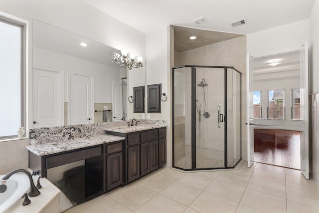 18111 Dockside Landing Dr, Cypress, TX 77433 - full bath featuring a shower stall, tile patterned floors, vanity, and tiled tub