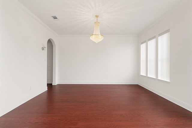 18111 Dockside Landing Dr, Cypress, TX 77433 - unfurnished room with arched walkways, ornamental molding, dark wood finished floors, and baseboards