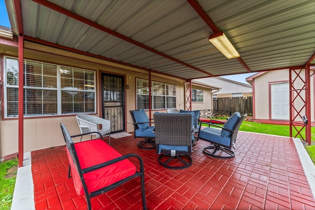 view of patio with a storage shed