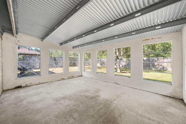 unfurnished sunroom featuring a healthy amount of sunlight