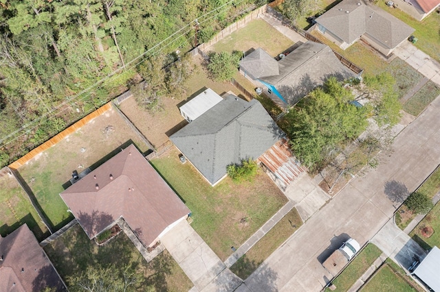 birds eye view of property with a residential view