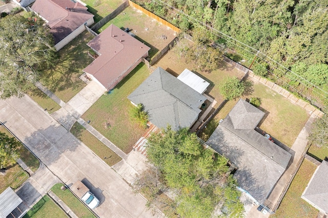 birds eye view of property with a residential view