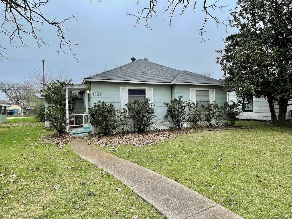 view of home's exterior with a yard