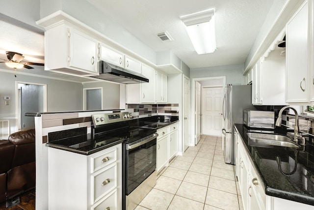 kitchen featuring sink, tasteful backsplash, ceiling fan, white cabinets, and stainless steel electric stove