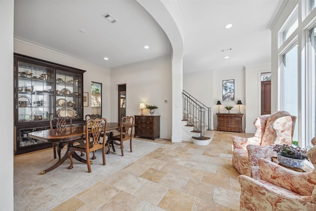 dining area featuring ornamental molding