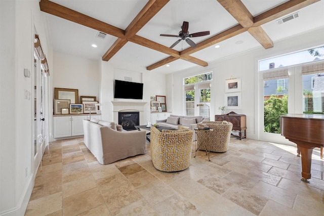 living room with ceiling fan, coffered ceiling, and beam ceiling