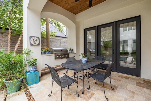 view of patio / terrace with an outdoor kitchen and area for grilling