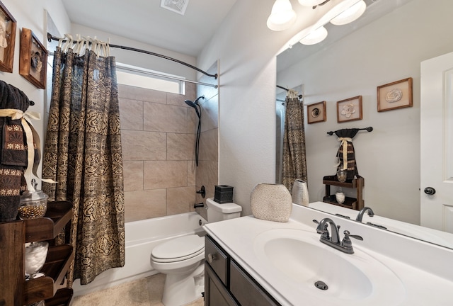 full bathroom featuring vanity, toilet, and shower / tub combo