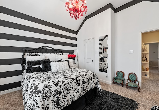 bedroom with carpet floors and high vaulted ceiling