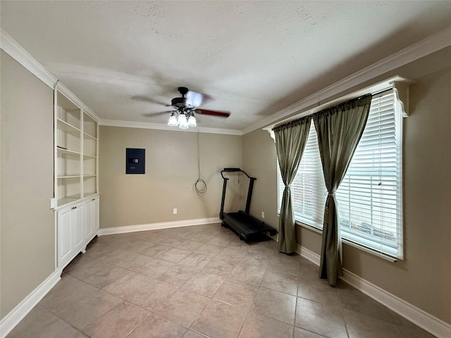 workout room featuring light tile patterned floors, crown molding, ceiling fan, electric panel, and a textured ceiling