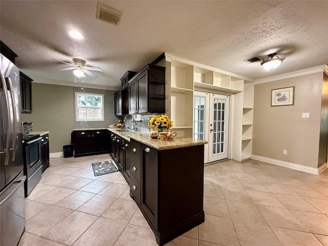 kitchen featuring french doors, sink, light tile patterned floors, stainless steel appliances, and light stone countertops