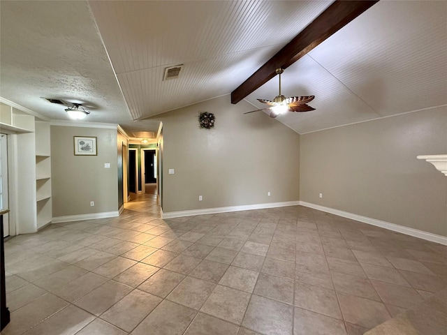 unfurnished room featuring light tile patterned flooring, ceiling fan, a textured ceiling, and vaulted ceiling with beams