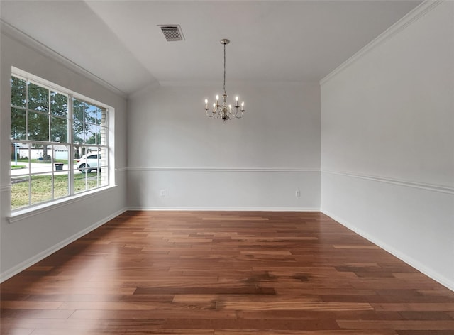 spare room with lofted ceiling, visible vents, baseboards, dark wood finished floors, and an inviting chandelier