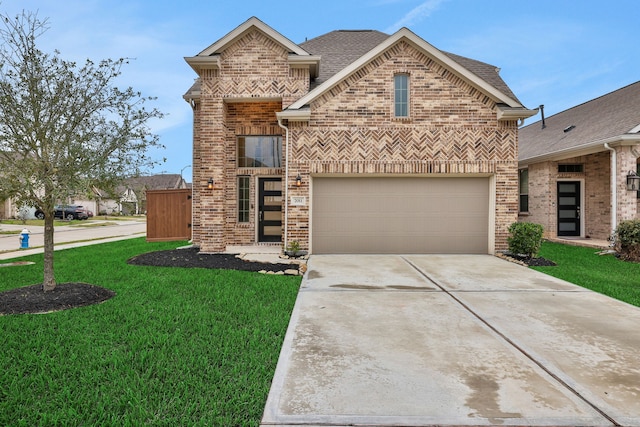 view of front of home with a garage, driveway, a shingled roof, brick siding, and a front yard