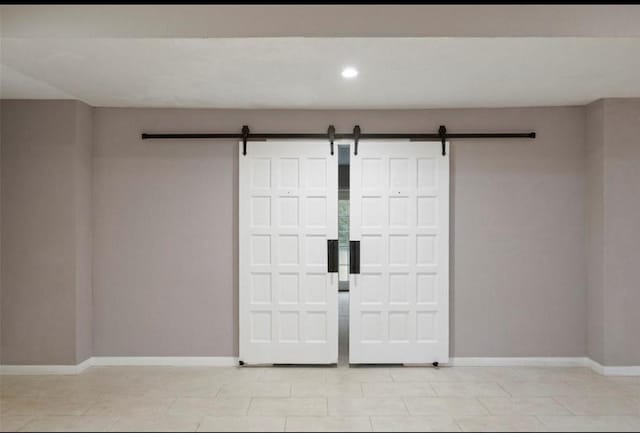 entryway with a barn door