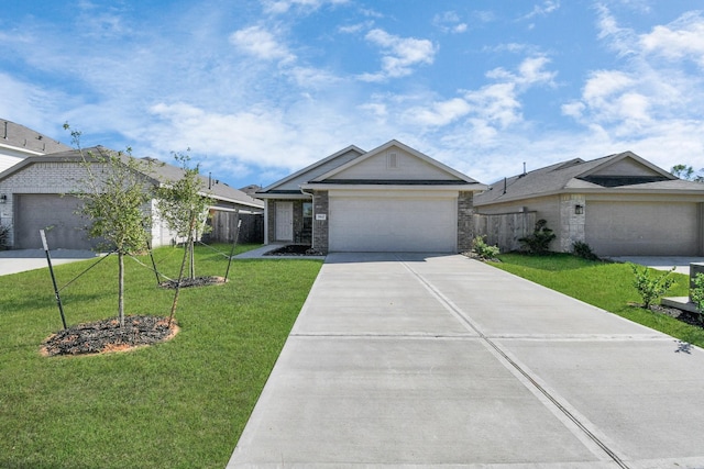 ranch-style house featuring a garage, brick siding, fence, driveway, and a front yard