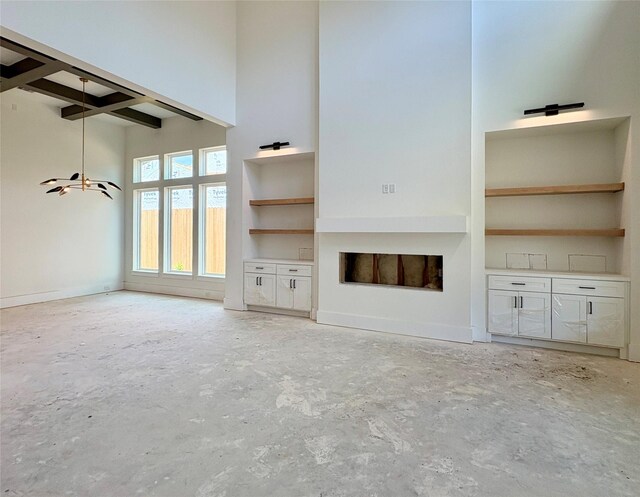 8545 Ridgepoint Dr, Houston, TX 77055 - unfurnished living room featuring a fireplace and beamed ceiling