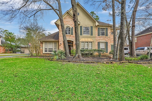 view of front of home featuring a front lawn