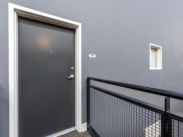 doorway to property with a balcony