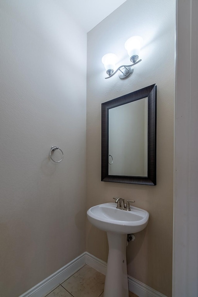 bathroom featuring sink and tile patterned floors