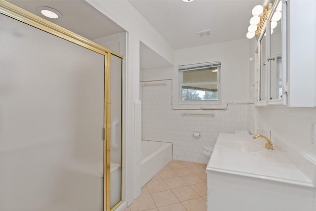 full bathroom with tile patterned flooring, tile walls, and separate shower and tub