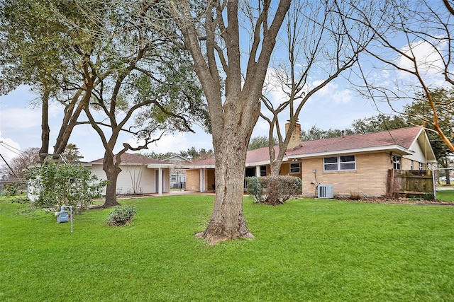 exterior space featuring central AC unit