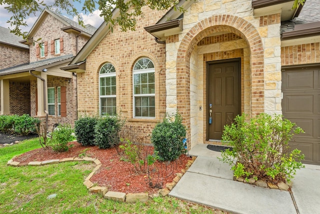 entrance to property with a garage