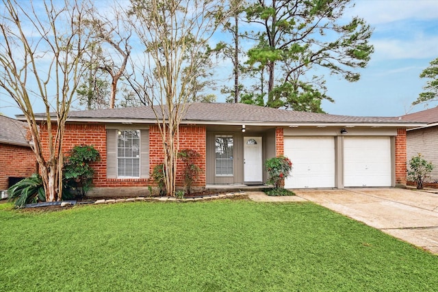 single story home featuring a garage and a front yard