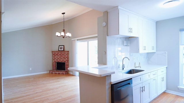 2300 Augusta Dr Unit 22, Houston, TX 77057 - kitchen featuring white cabinets, a sink, light wood finished floors, dishwasher, and baseboards