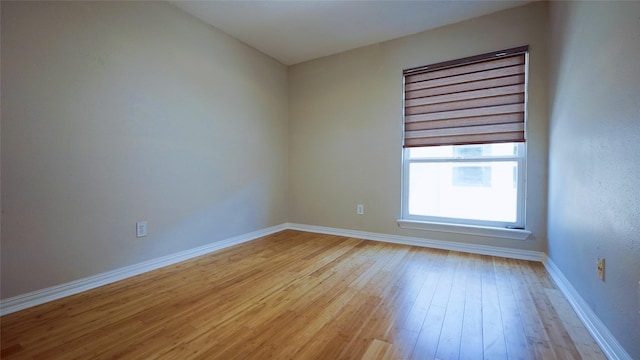 2300 Augusta Dr Unit 22, Houston, TX 77057 - empty room with baseboards and light wood finished floors