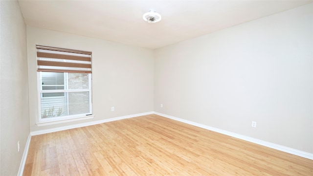 2300 Augusta Dr Unit 22, Houston, TX 77057 - unfurnished room with wood finished floors and baseboards