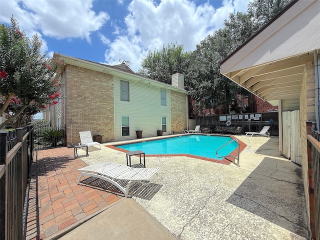2300 Augusta Dr Unit 22, Houston, TX 77057 - view of swimming pool featuring a patio