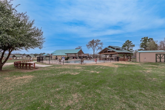 view of yard with fence and a gazebo