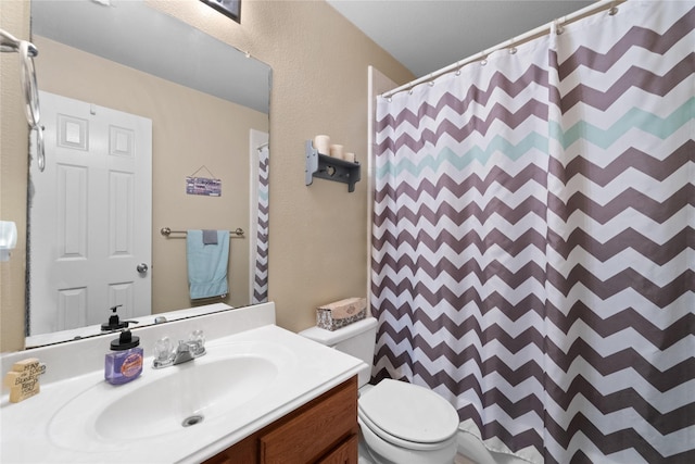 21324 Village Crossing Ln, Porter, TX 77365 - bathroom with toilet, vanity, curtained shower, and a textured wall