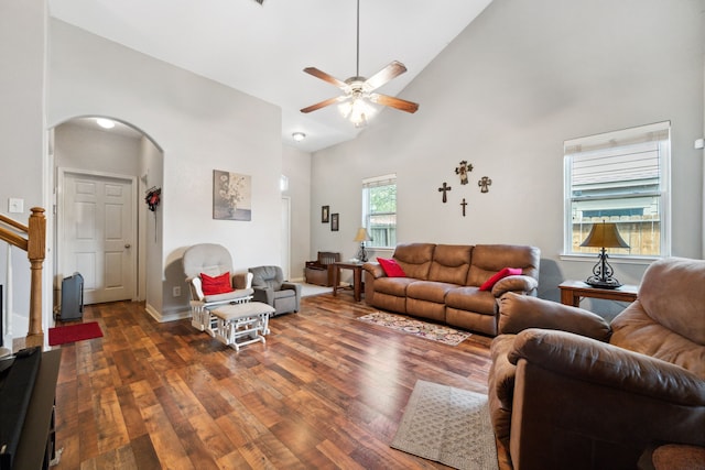 21324 Village Crossing Ln, Porter, TX 77365 - living room with arched walkways, wood finished floors, a ceiling fan, high vaulted ceiling, and baseboards