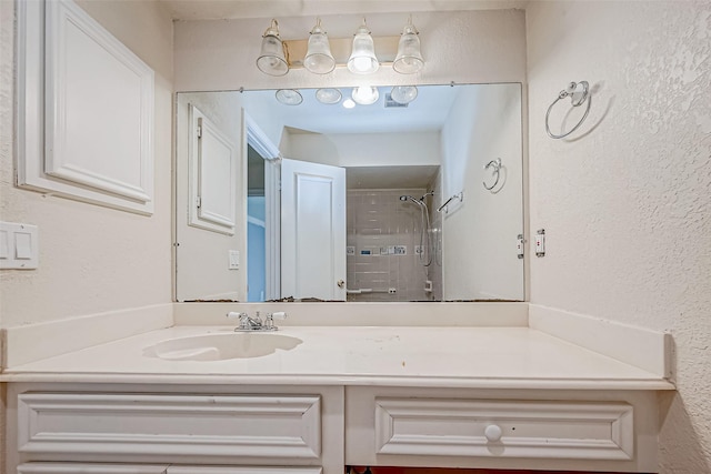 bathroom featuring vanity and walk in shower