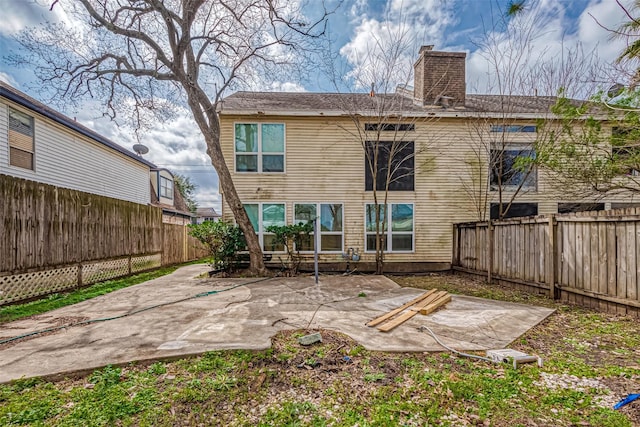 rear view of property with a patio