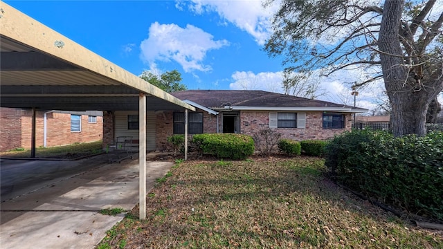 view of front of home featuring a carport