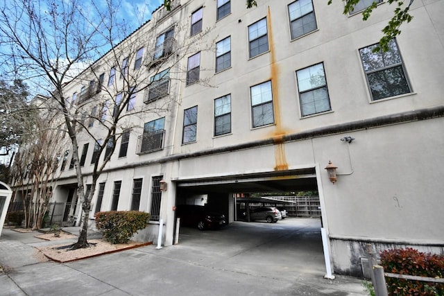 view of property with driveway