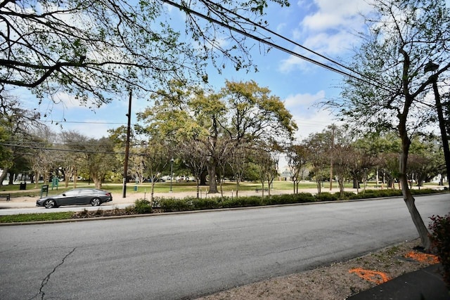 view of road featuring curbs