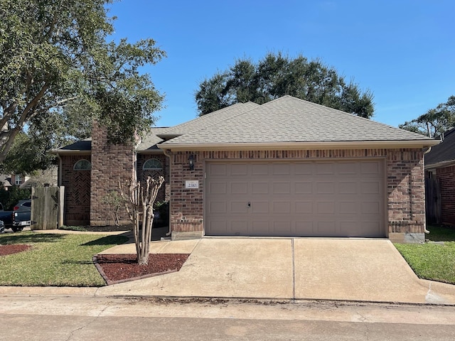 ranch-style home featuring a front lawn