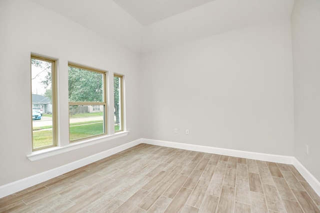 unfurnished room with light hardwood / wood-style floors