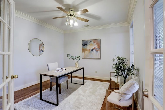 home office with hardwood / wood-style flooring, ceiling fan, crown molding, and french doors