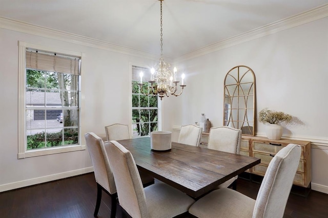 dining space featuring crown molding, dark wood-type flooring, and plenty of natural light