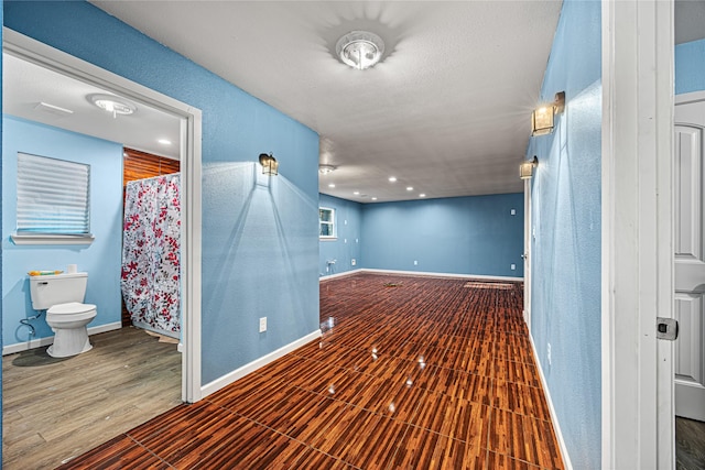 spare room with hardwood / wood-style floors