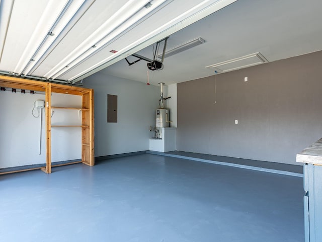 garage with a garage door opener, electric panel, and water heater