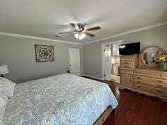 bedroom featuring dark hardwood / wood-style flooring, ornamental molding, and ceiling fan