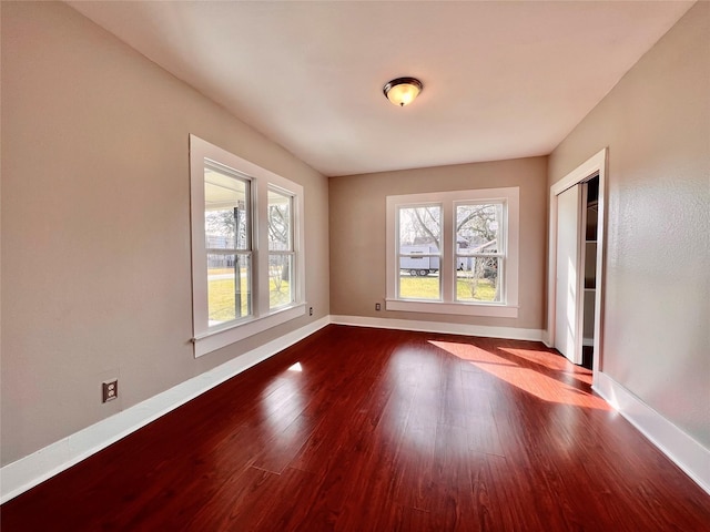 empty room featuring wood-type flooring