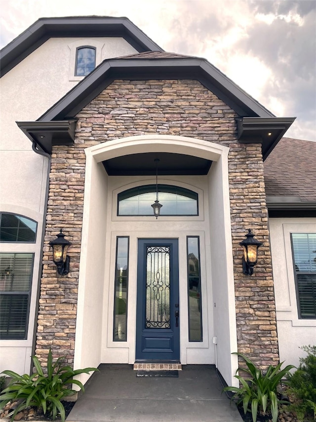 11707 W Grand Pond Dr, Montgomery, TX 77356 - entrance to property featuring stucco siding and stone siding